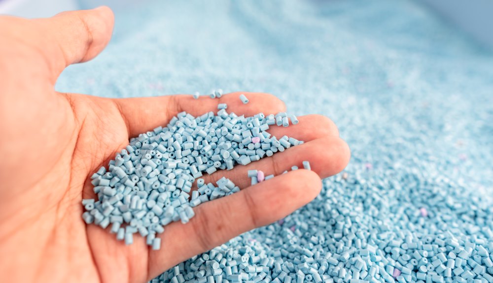 Plastic resin pellets used for injection molding.